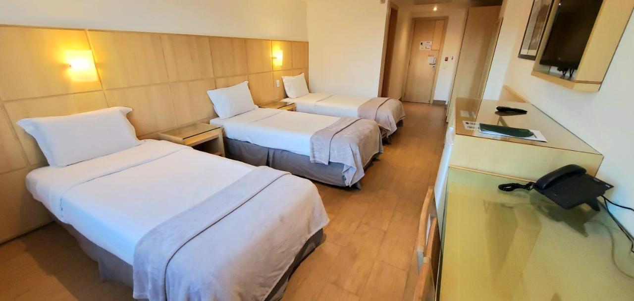 Quarto Triplo com Vista da Cidade