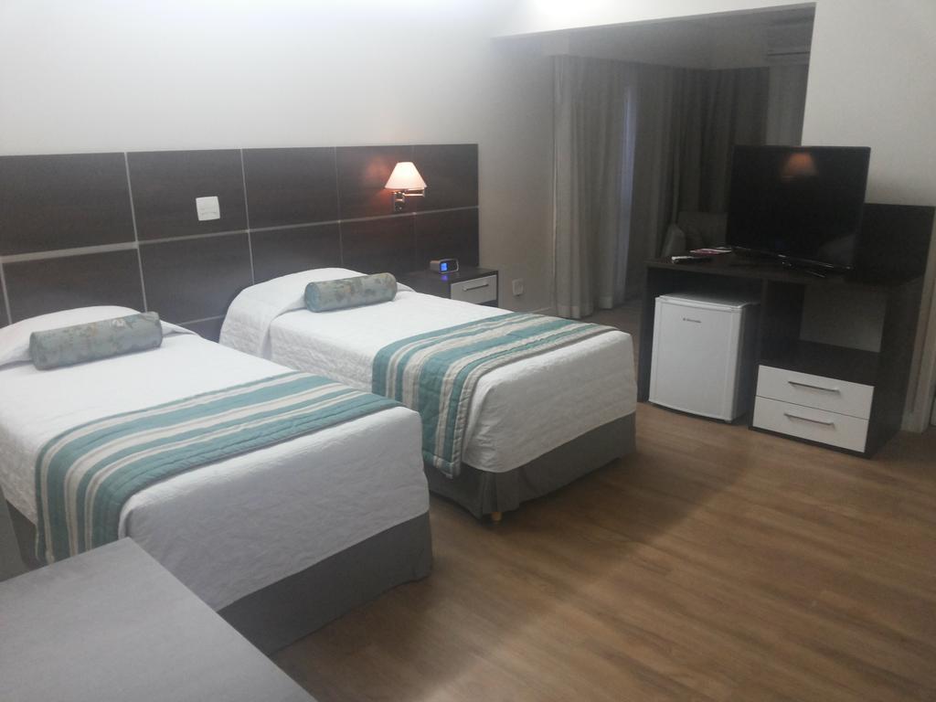 Quarto Triplo Premium